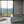 Spa en inox STEEL AND STYLE SPaKUB 2 places, vue de face avec jets d'eau visibles et espace pour deux personnes.