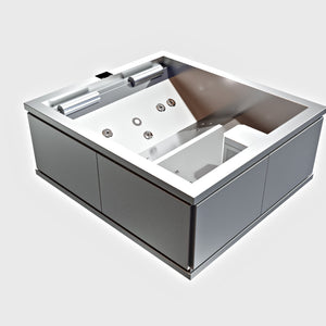 Spa en inox STEEL AND STYLE Spakut 2 places avec siège confortable et jets d'hydrothérapie visibles dans l'image.